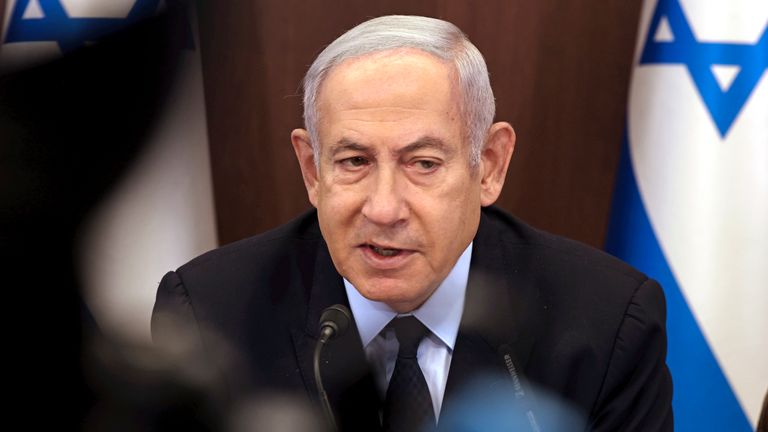 Israeli Prime Minister Benjamin Netanyahu chairs a weekly cabinet meeting at his office in Jerusalem Sunday, Aug. 27, 2023 (Menahem Kahana/Pool Photo via AP)