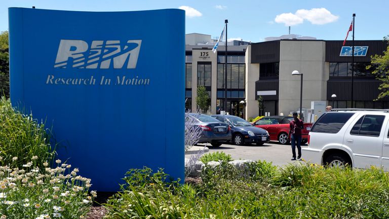 The exterior of one of the Research In Motion Limited (RIM) buildings is seen in Waterloo July 10, 2012. Research In Motion Ltd&#39;s slate of directors was re-elected at the BlackBerry maker&#39;s annual general meeting on Tuesday, Chairwoman Barbara Stymiest said. REUTERS/ Mike Cassese (CANADA - Tags: BUSINESS)