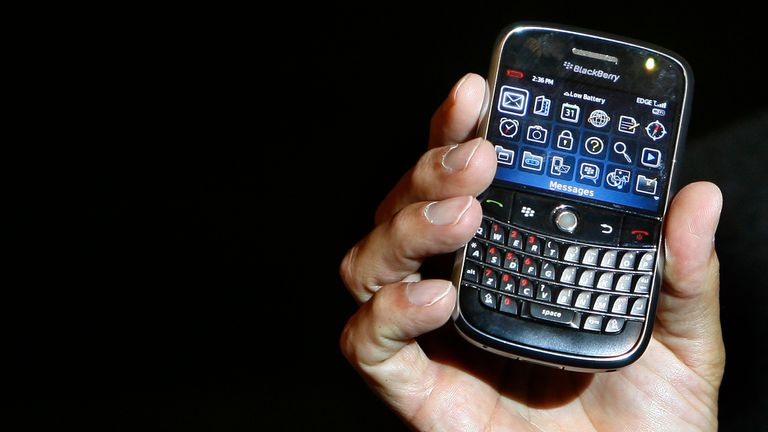 Jim Balsillie, co-chief executive of Research In Motion (RIM), holds the new Blackberry Bold handset during its launch in Mumbai September 18, 2008. Research in Motion Ltd will add new carriers in fast-growing emerging markets, and does not yet see an adverse impact from a widening global financial crisis, Balsillie said on Thursday. REUTERS/Punit Paranjpe(INDIA)