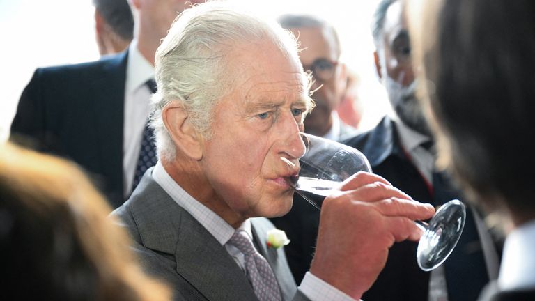 King Charles tastes some wine during a visit to a festival in celebration of British and French culture and business at Place de la Bourse in Bordeaux 