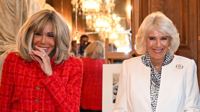 Brigitte Macron and Queen Camilla laugh during their visit to the "Bibliotheque Nationale de France" (BNF - French National Library) 