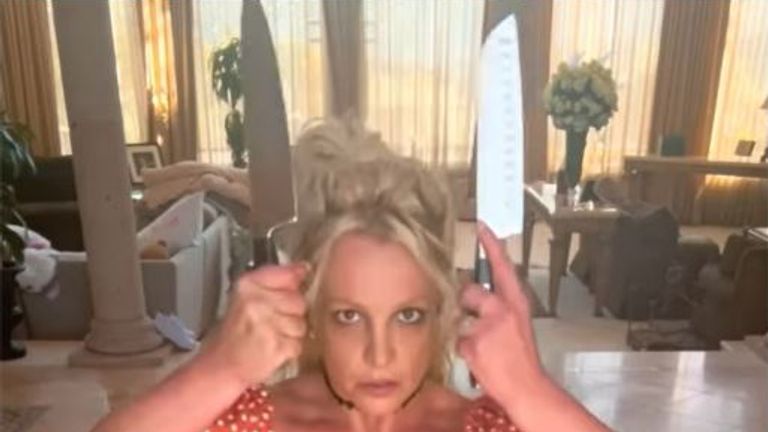Britney Spears dancing with the knives, which she says are fake, in a video she posted on her Instagram account