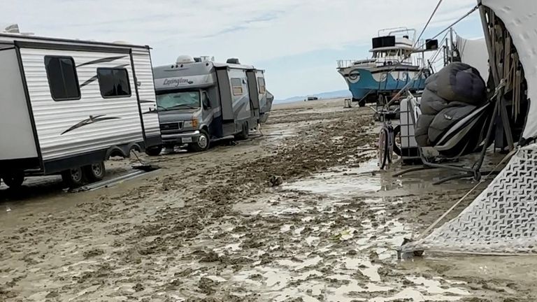 The mud covers the ground at the site of the Burning Man festival in Black Rock, Nevada, U.S., September 2, 2023, in this screen grab obtained from a social media video. Paul Reder/via REUTERS THIS IMAGE HAS BEEN SUPPLIED BY A THIRD PARTY. MANDATORY CREDIT. NO RESALES. NO ARCHIVES.
