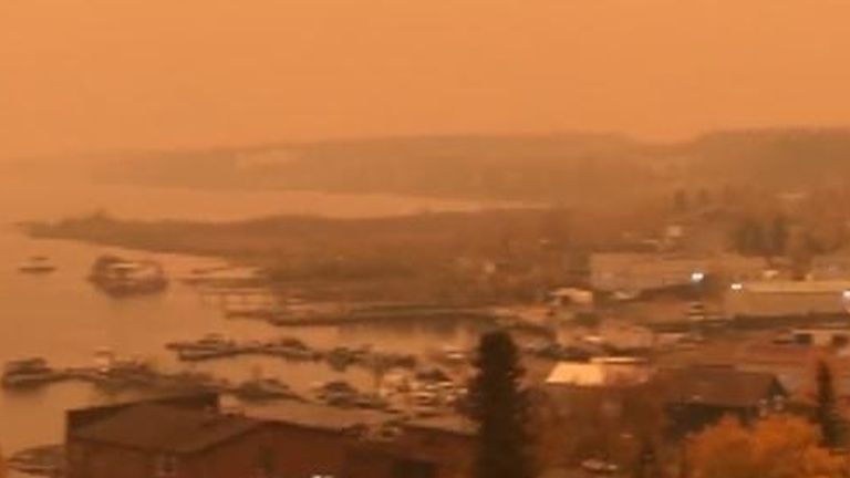 Wildfires in Alberta Turn Skies in Yellowknife Red Amid Air Quality Warning