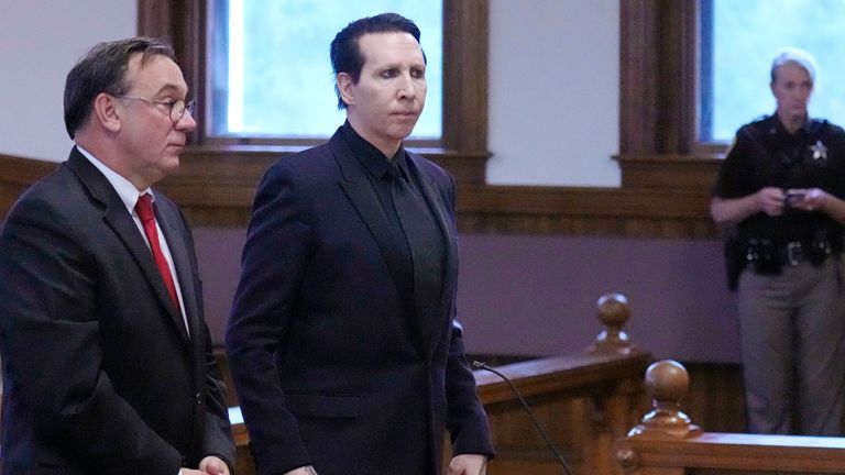Musical artist Marilyn Manson, whose legal name is Brian Hugh Warner  with his attorney Kent Barker during an appearance in Belknap Superior Court, 
Pic:AP