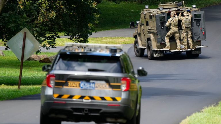 Law enforcement officers continue the search for escaped convict Danelo Cavalcante in Glenmoore, Pa., Monday, Sept. 11, 2023. (AP Photo/Matt Rourke)