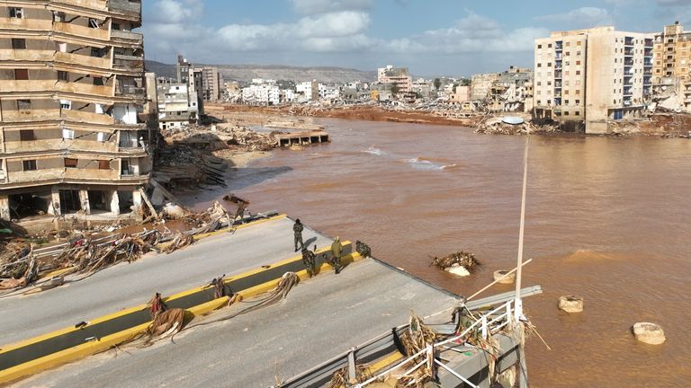 A general view of the city of Derna is seen on Tuesday, Sept. 12., 2023. Mediterranean storm Daniel caused devastating floods in Libya that broke dams and swept away entire neighborhoods in multiple coastal towns, the destruction appeared greatest in Derna city. (AP Photo/Jamal Alkomaty)