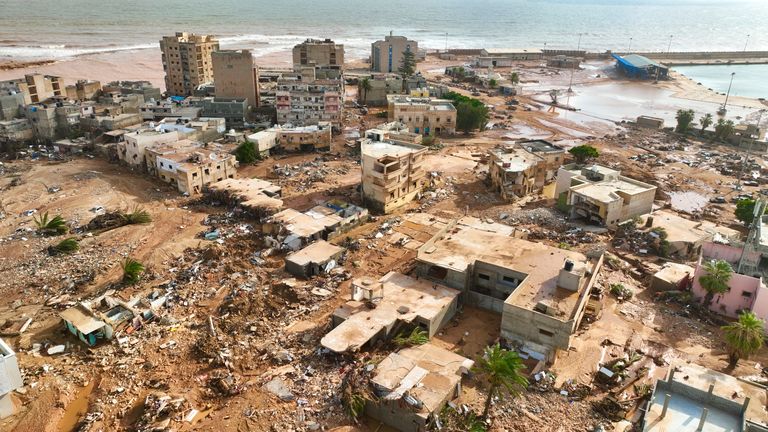 A general view of the city of Derna is seen on Tuesday, Sept. 12., 2023. Mediterranean storm Daniel caused devastating floods in Libya that broke dams and swept away entire neighborhoods in multiple coastal towns, the destruction appeared greatest in Derna city. (AP Photo/Jamal Alkomaty)