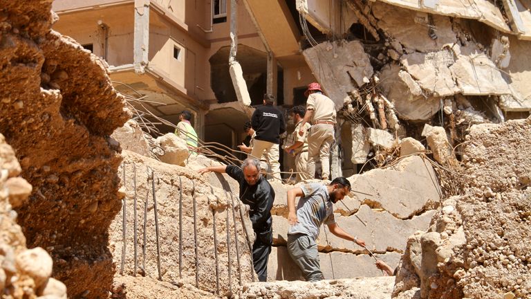 People look for survivors in Derna, Libya. Pic: AP