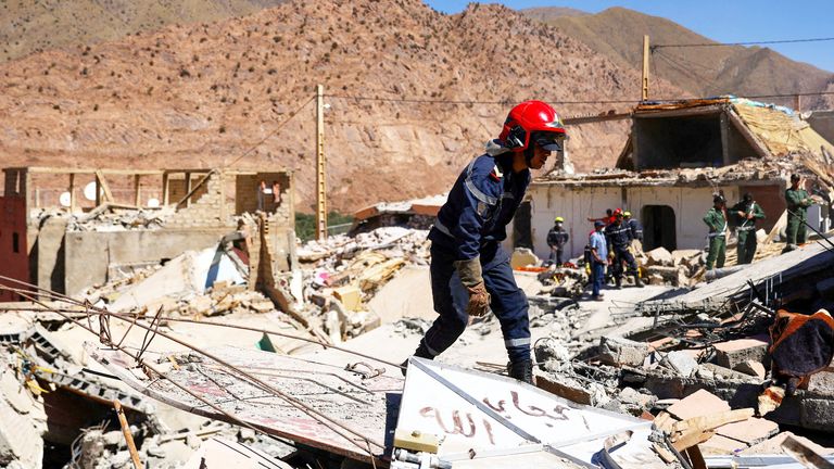 A search worker stands among rubble in the aftermath of a deadly earthquake in Talat N&#39;yaaqoub, Morocco, September 11, 2023 