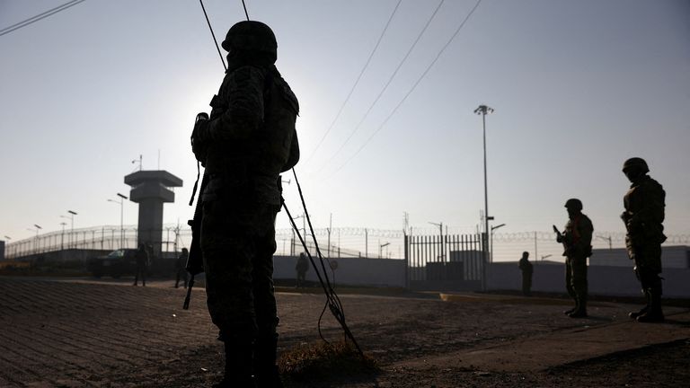 Security forces outside the Altiplano high security prison in Mexico where Guzman Lopez was held after his arrest in January
