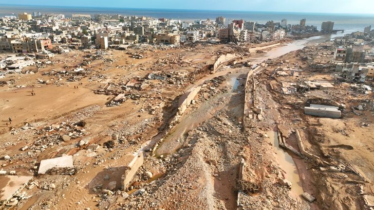 A general view of the city of Derna is seen on Tuesday, Sept. 12., 2023. Mediterranean storm Daniel caused devastating floods in Libya that broke dams and swept away entire neighborhoods in multiple coastal towns, the destruction appeared greatest in Derna city. (AP Photo/Jamal Alkomaty)