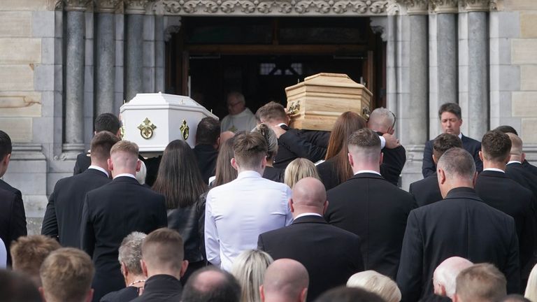 The coffins of siblings Luke, 24, and Grace McSweeney, 18, are carried into Saints Peter and Paul&#39;s Church, Clonmel, Co. Tipperary, ahead of their funeral service. Picture date: Friday September 1, 2023.