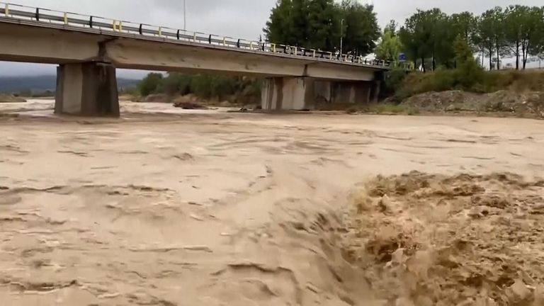 Torrential rain hit the Greek island of Evia, damaging roads and flooding homes.