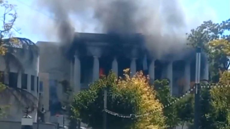 A screengrab from social media shows smoke billowing from the top of a building, alleged to be the Black Sea Fleet Headquarters, following a missile attack in Sevastopol on September 22. X
