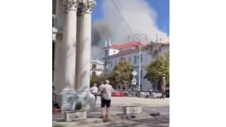 A screengrab from social media shows smoke billowing from the top of a building, alleged to be the Black Sea Fleet Headquarters, following a missile attack in Sevastopol on September 22. X
