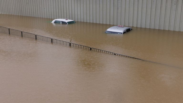 Cars submerged in the water