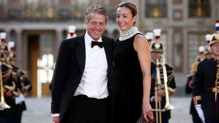 Hugh Grant and Anna Elisabet Eberstein arrive to attend the state dinner