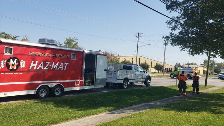 Emergency responders set up a staging area near Teutopolis High School