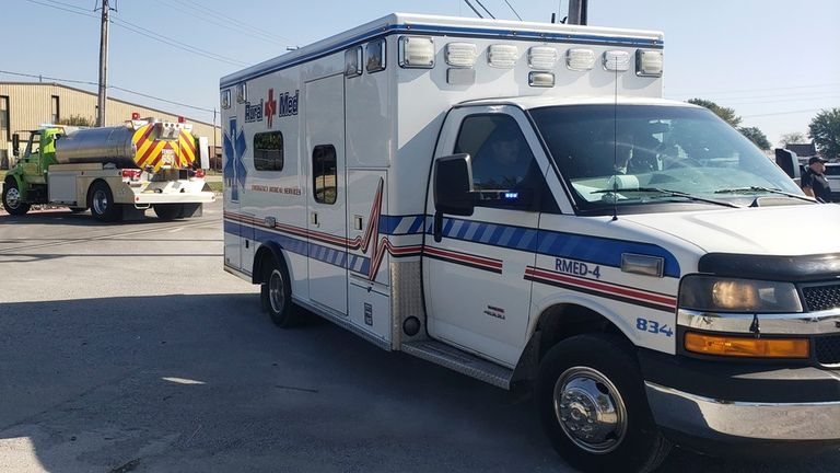 Emergency responders set up a staging area near Teutopolis High School 