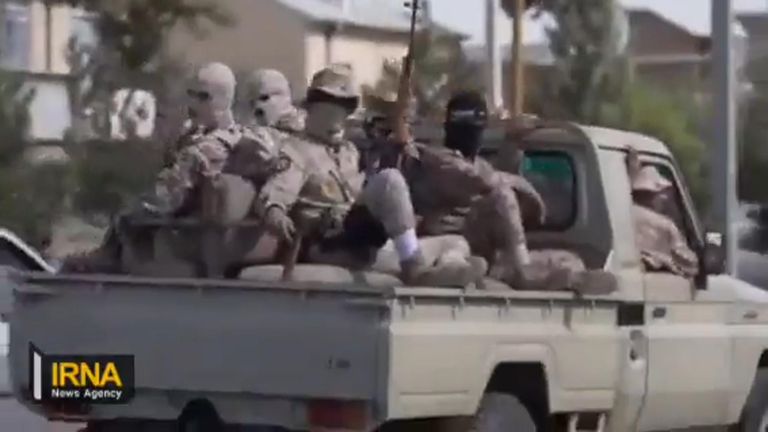 A convoy moves towards Saqqez, the birthplace of Mahsa Amini.