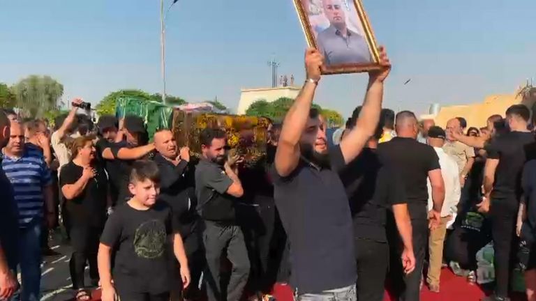 First funerals held in Iraq for some of those killed in the fire.