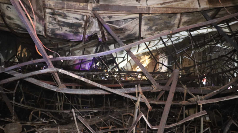 The mangled infrastructure of the venue after the fire. Pic: Rudaw
