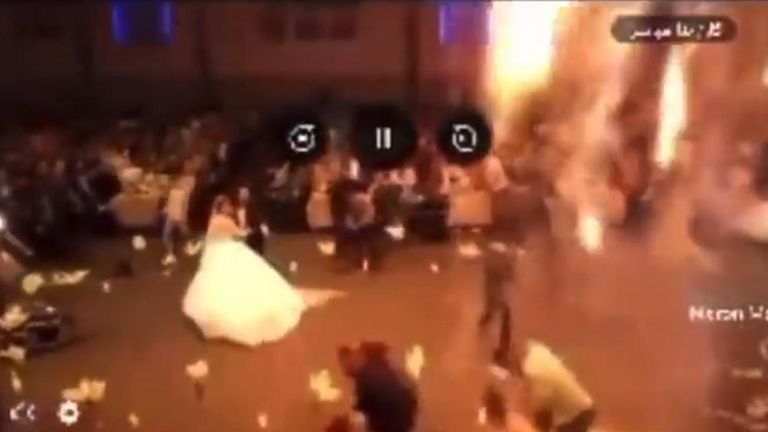 Video footage shows the moment the bride and groom were dancing as the fire started. Pic: Rudaw