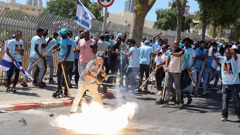 Benjamin Netanyahu plans to deport all African migrants from Israel after Eritrean groups involved in violent clashes | World News | Sky News