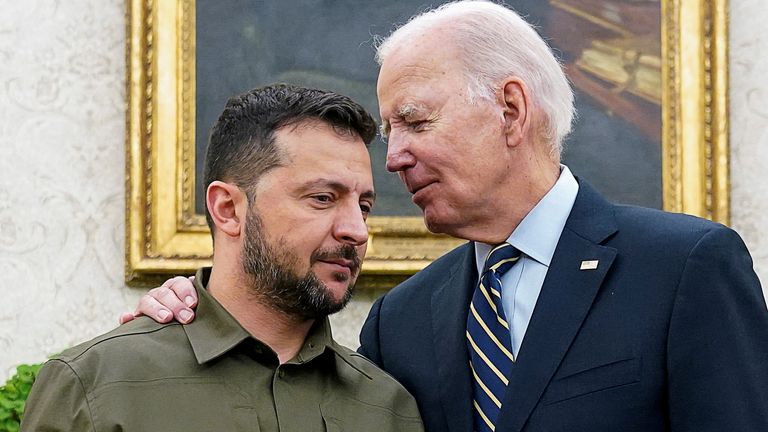 Ukrainian President Volodymyr Zelenskyy is embraced by US President Joe Biden in the Oval Office of the White House