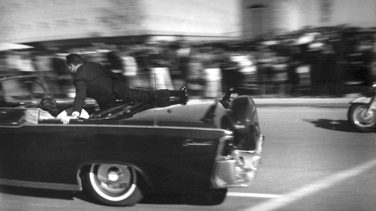 Limousine carrying mortally wounded President John F. Kennedy races toward the hospital. Pic: AP