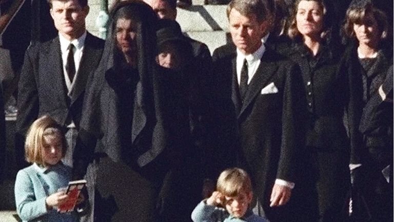 John F. Kennedy Jr., salutes his father&#39;s casket in Washington. Pic: AP