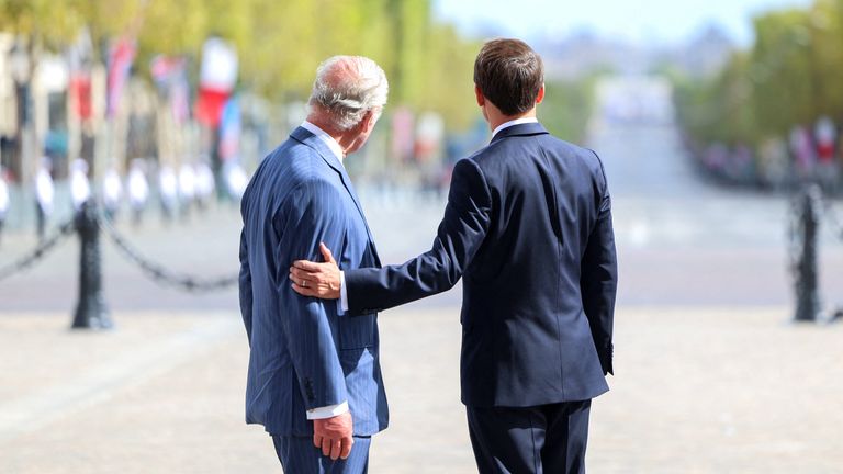 PARIS, FRANCE - SEPTEMBER 20: King Charles III and President of France, Emmanuel Macron watch The Patrouille de France perform a flypast over the Champs-Elysees marking the end of the formal part of the welcome ceremony at The Arc De Triomphe on September 20, 2023 in Paris, France. The King and The Queen&#39;s first state visit to France will take place in Paris, Versailles and Bordeaux from Wednesday 20th to Friday 23rd 2023. The visit had been initially scheduled for March 26th - 29th but had to b