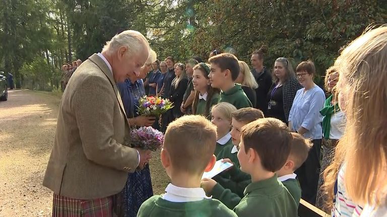 King recieves card from children at Crathie Kirk