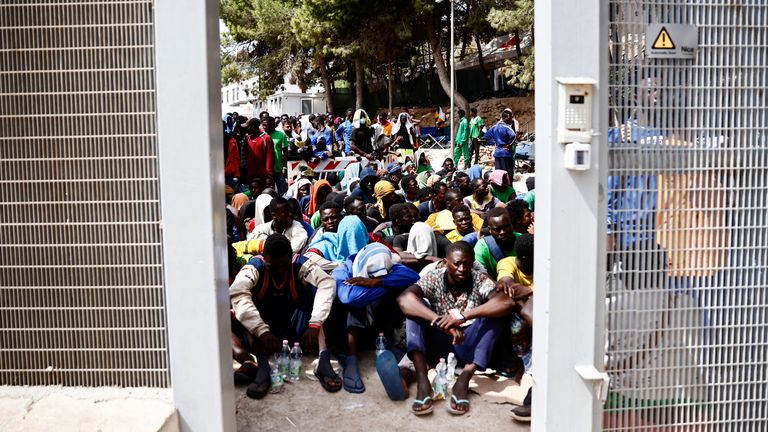 Migrants are seen inside the hotspot, on the Sicilian island of Lampedusa, Italy, September 16, 2023. REUTERS/Yara Nardi
