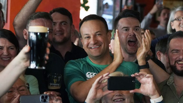 Taoiseach Leo Varadkar (centre) celebrates in Mattie and Eddies bar in Washington, DC, as he watches Ireland win the Six Nations title and the Grand Slam in Dublin after beating England. Picture date: Saturday March 18, 2023.