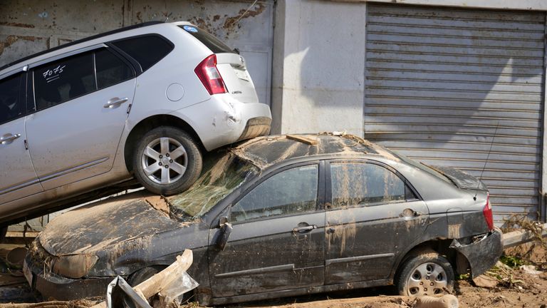 Cars stacked on top of each other. Pic: Libyan government via AP