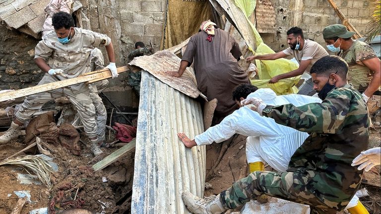 A crowd of volunteers, health workers, troops and neighbours rushed to the site after news spread of noises beneath the rubble