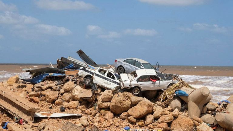 A view shows the damaged cars, after a powerful storm and heavy rainfall hit Libya, in Derna, Libya 