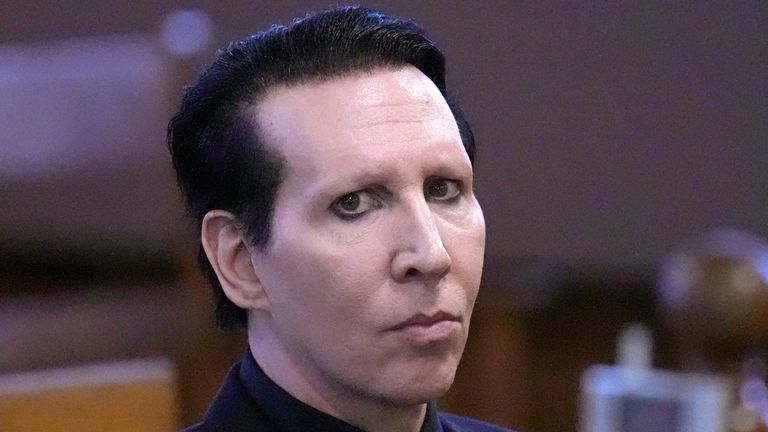 Musical artist Marilyn Manson, whose legal name is Brian Hugh Warner, waits for the judge to arrive in Belknap Superior Court 
Pic:AP
Pic:AP