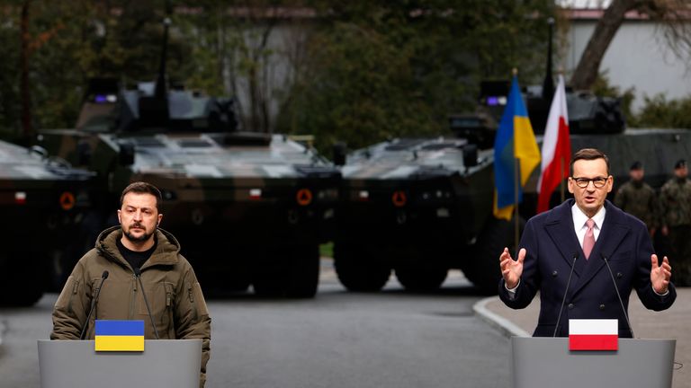 FILE - Poland&#39;s Prime Minister Mateusz Morawiecki, right, and Ukrainian President Volodymyr Zelenskyy attend a press conference in Warsaw, Poland, Wednesday, April 5, 2023. Poland&#39;s prime minister said on late Wednesday his country is no longer sending arms to Ukraine, a comment that appeared aimed at pressuring Kyiv but put Poland&#39;s status as a major source of military equipment in doubt as a trade dispute between the neighboring states escalates. (AP Photo/Michal Dyjuk, File)