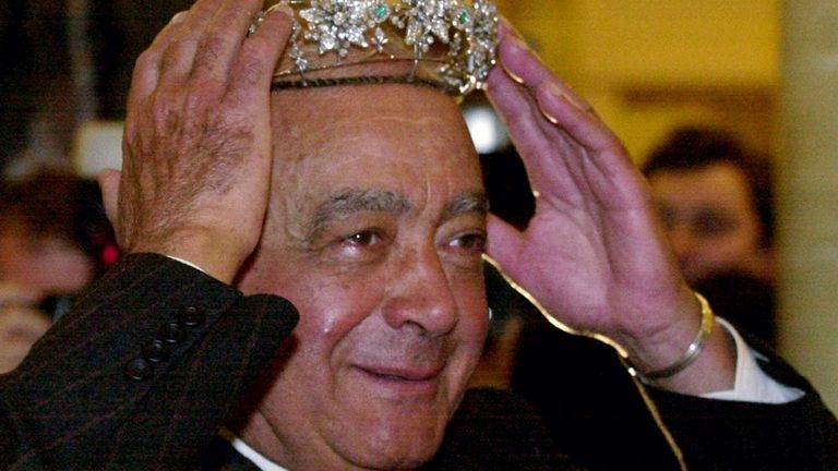 Fayed tries on tiara in Harrods. Pic: AP