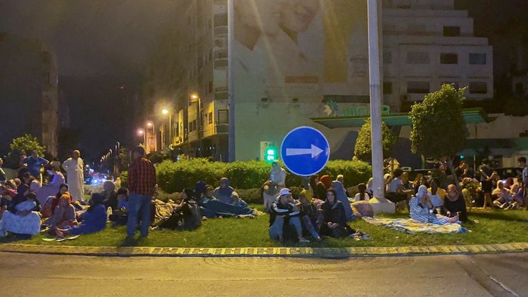 People gather on a street in Casablanca following the powerful earthquake