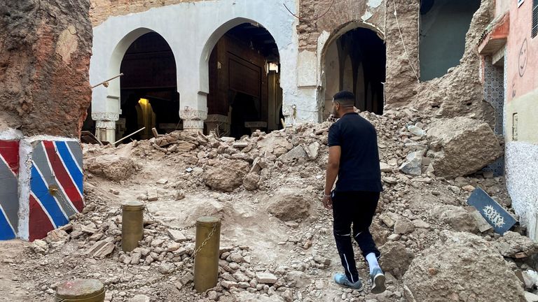 A man looks at damage in the historic city of Marrakech, following a powerful earthquake in Morocco, September 9, 2023. REUTERS/Abdelhak Balhaki