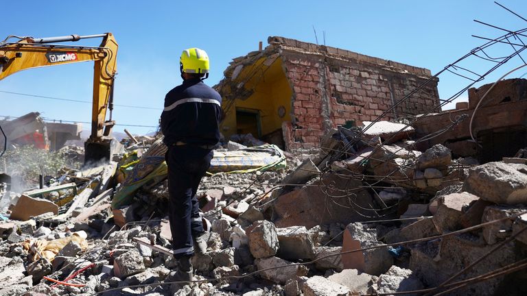 A worker stands among rubble in the aftermath of a deadly earthquake in Talat N&#39;yaaqoub, Morocco 