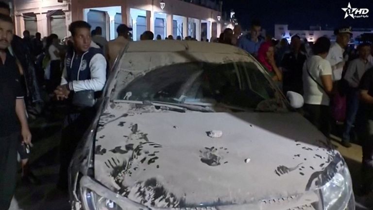 A car is covered in dust in the aftermath of the earthquake in Marrakech, Morocco September 9, 2023 in this screen grab taken from a video. Al Oula TV/Handout via REUTERS THIS IMAGE HAS BEEN SUPPLIED BY A THIRD PARTY. NO RESALES. NO ARCHIVES. MANDATORY CREDIT. MOROCCO OUT. NO COMMERCIAL OR EDITORIAL SALES IN MOROCCO