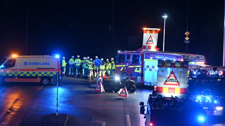 Rescue services were on the scene in the early hours. Pic: Björn Larsson Rosvall/TT News Agency via AP