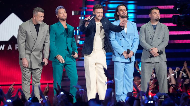 Joey Fatone, from left, Lance Bass, Justin Timberlake, JC Chasez and Chris Kirkpatrick of NYSYNC present the award for best pop during the MTV Video Music Awards on Tuesday, Sept. 12, 2023, at the Prudential Center in Newark, N.J. (Photo by Charles Sykes/Invision/AP)