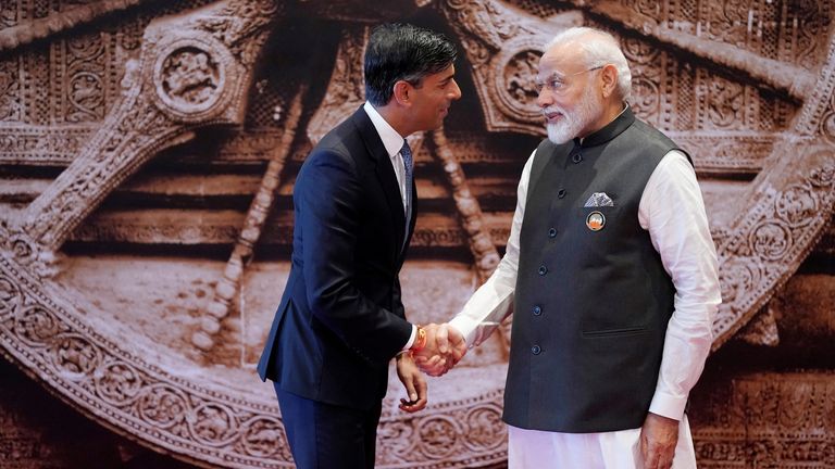 Indian Prime Minister Narendra Modi shakes hand with British Prime Minister Rishi Sunak upon his arrival at Bharat Mandapam convention center for the G20 Summit, in New Delhi, India, Saturday, Sept. 9, 2023. Evan Vucci/Pool via REUTERS