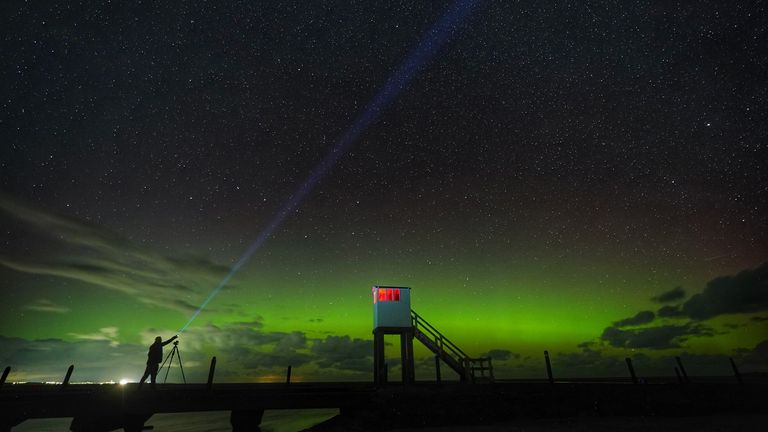 A stunning show of the Northern lights over the refuge hut on the Holy Island causeway in Northumberland . Picture date: Wednesday September 13, 2023.